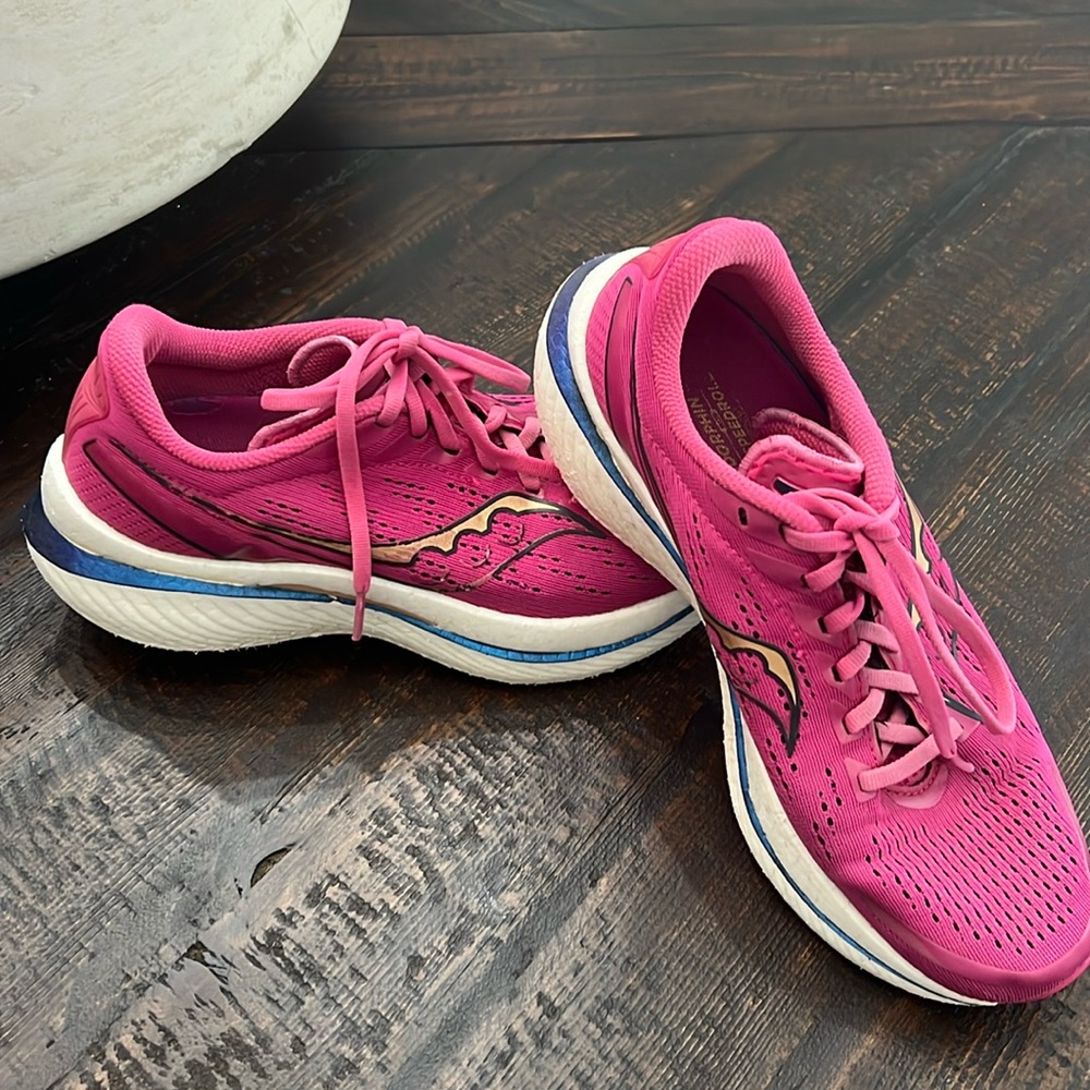Hot pink saucony shoes. Great for walking and still have some life in them